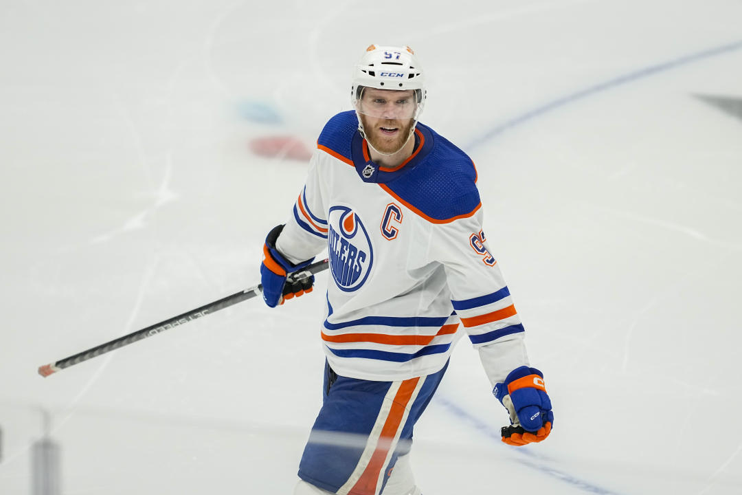 Edmonton Oilers center Connor McDavid reacts after a ruling against him by the officials during overtime in Game 1 of the NHL hockey Western Conference Stanley Cup playoff finals against the Dallas Stars, Thursday, May 23, 2024, in Dallas. (AP Photo/Tony Gutierrez)